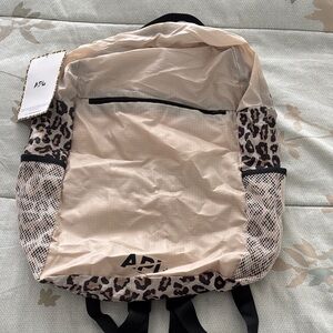 APL Athletic Propulsion Labs All-purpose packable Beige & Leopard Print Backpack